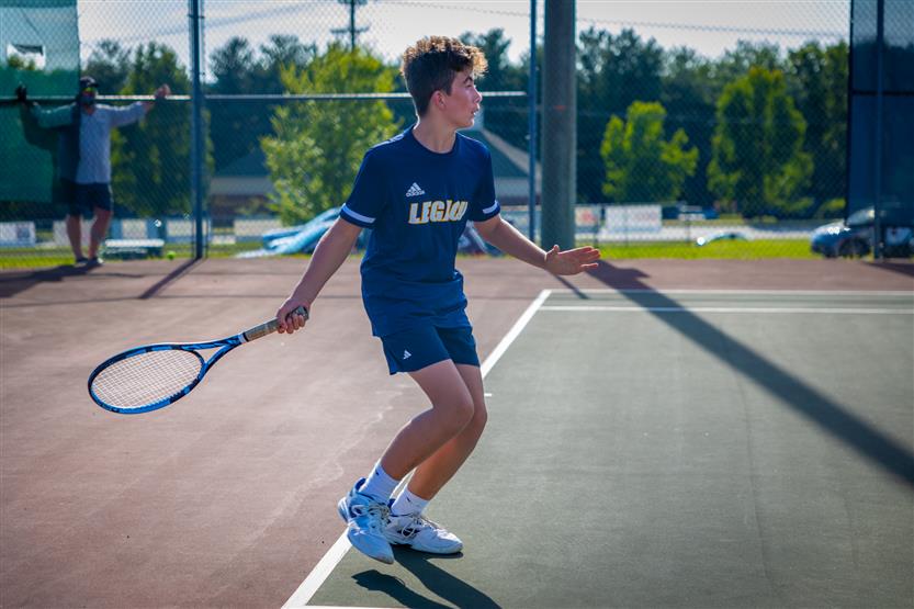 Students play tennis